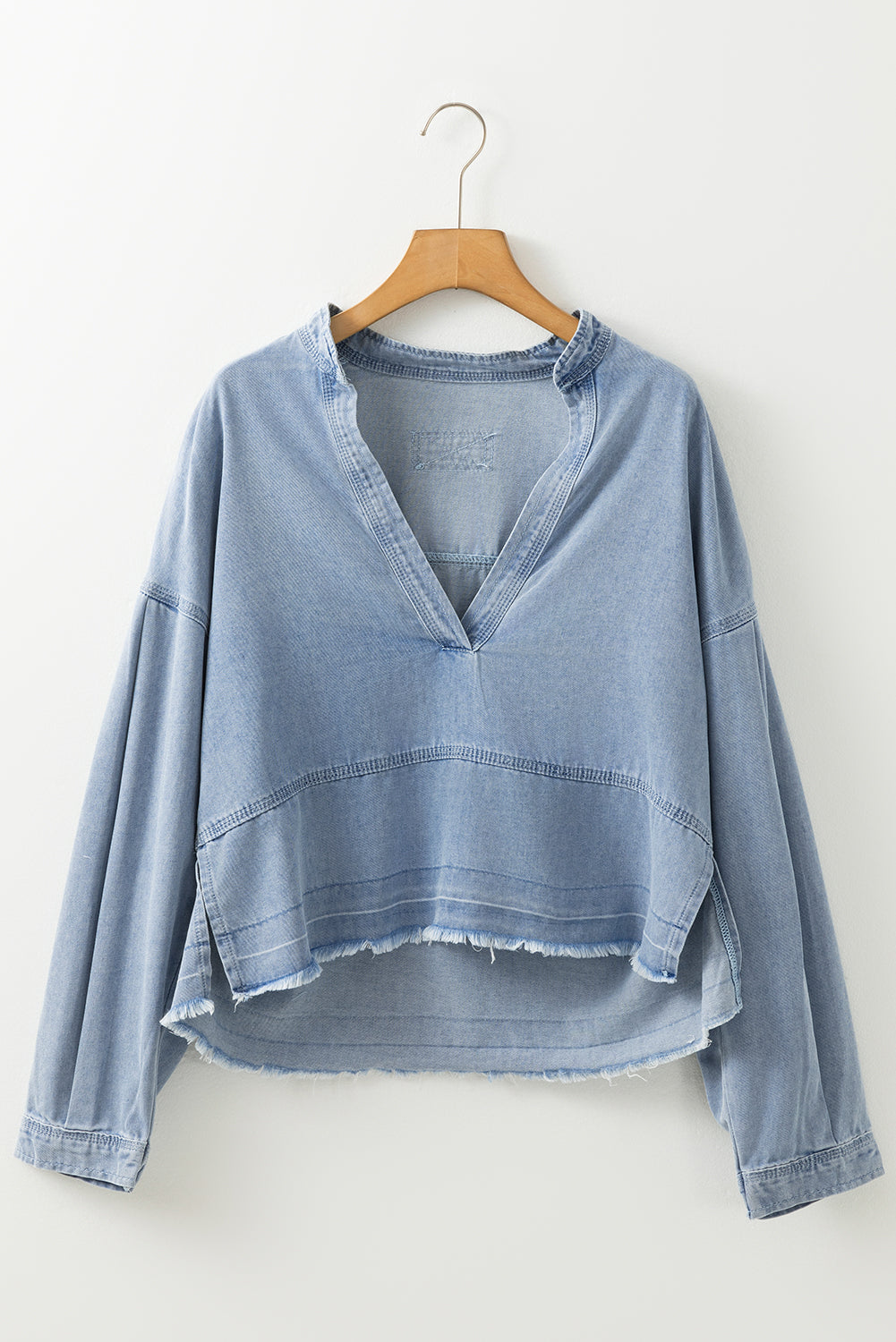 Beau Blue Light Wash Exposed Stitching Raw Hem V Neck Denim Top