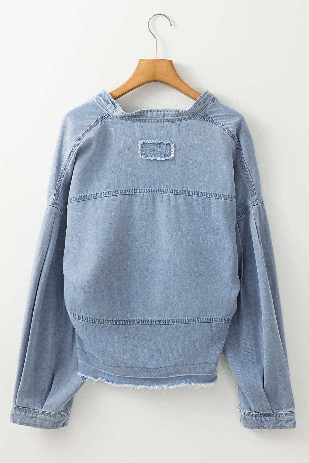 Beau Blue Light Wash Exposed Stitching Raw Hem V Neck Denim Top